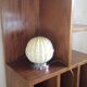 Authentic 20th-century Art Deco globe lamp in coloured glass.