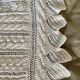 Old knitted cotton bed cover