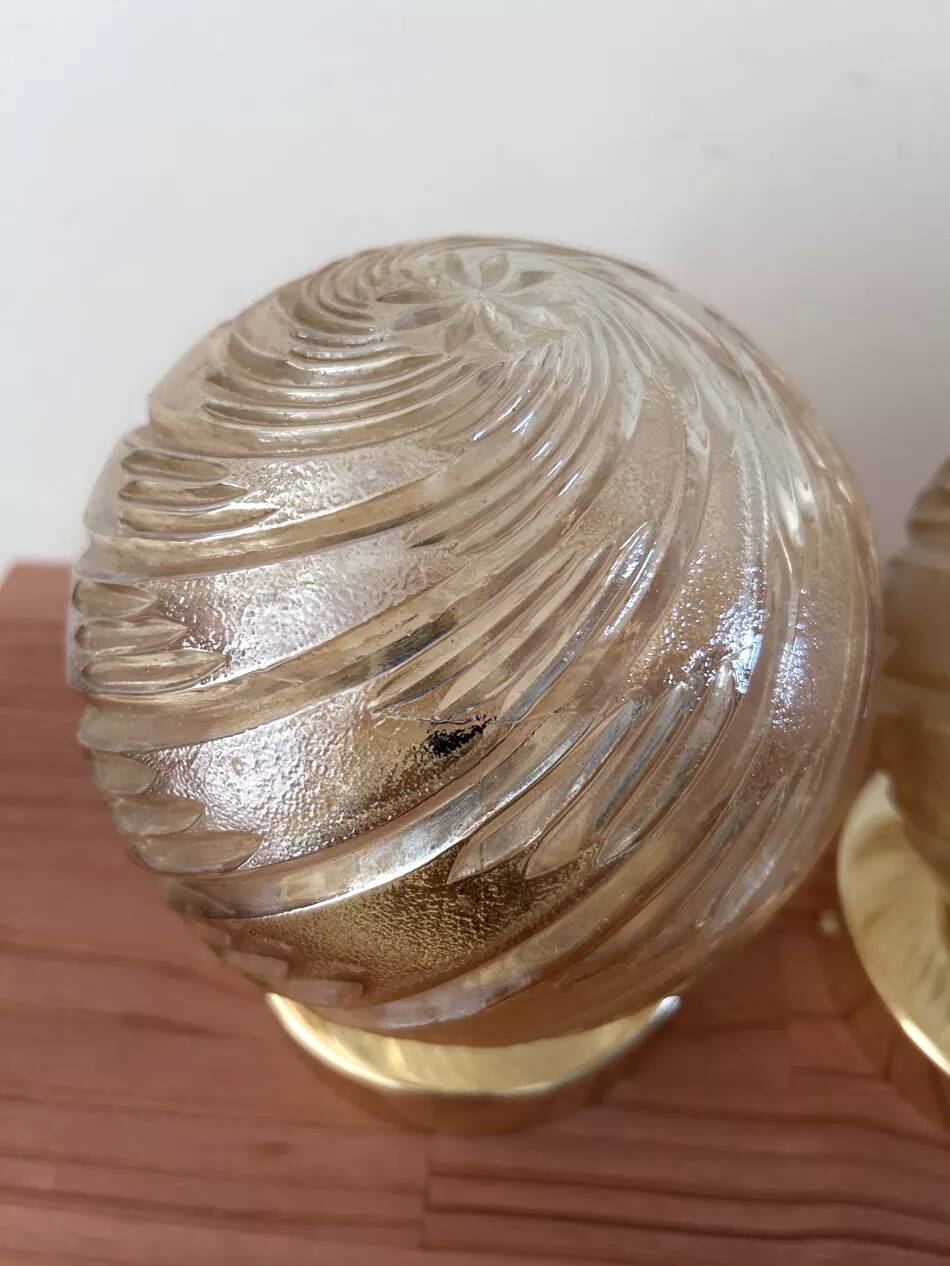 Pair of golden globe wall lights