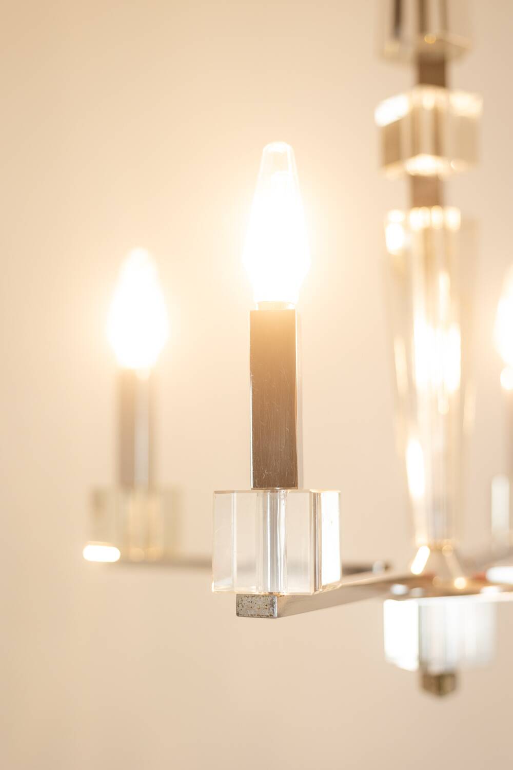 Jacques Adnet. Modernist chandelier in chromed metal. Circa 1940.