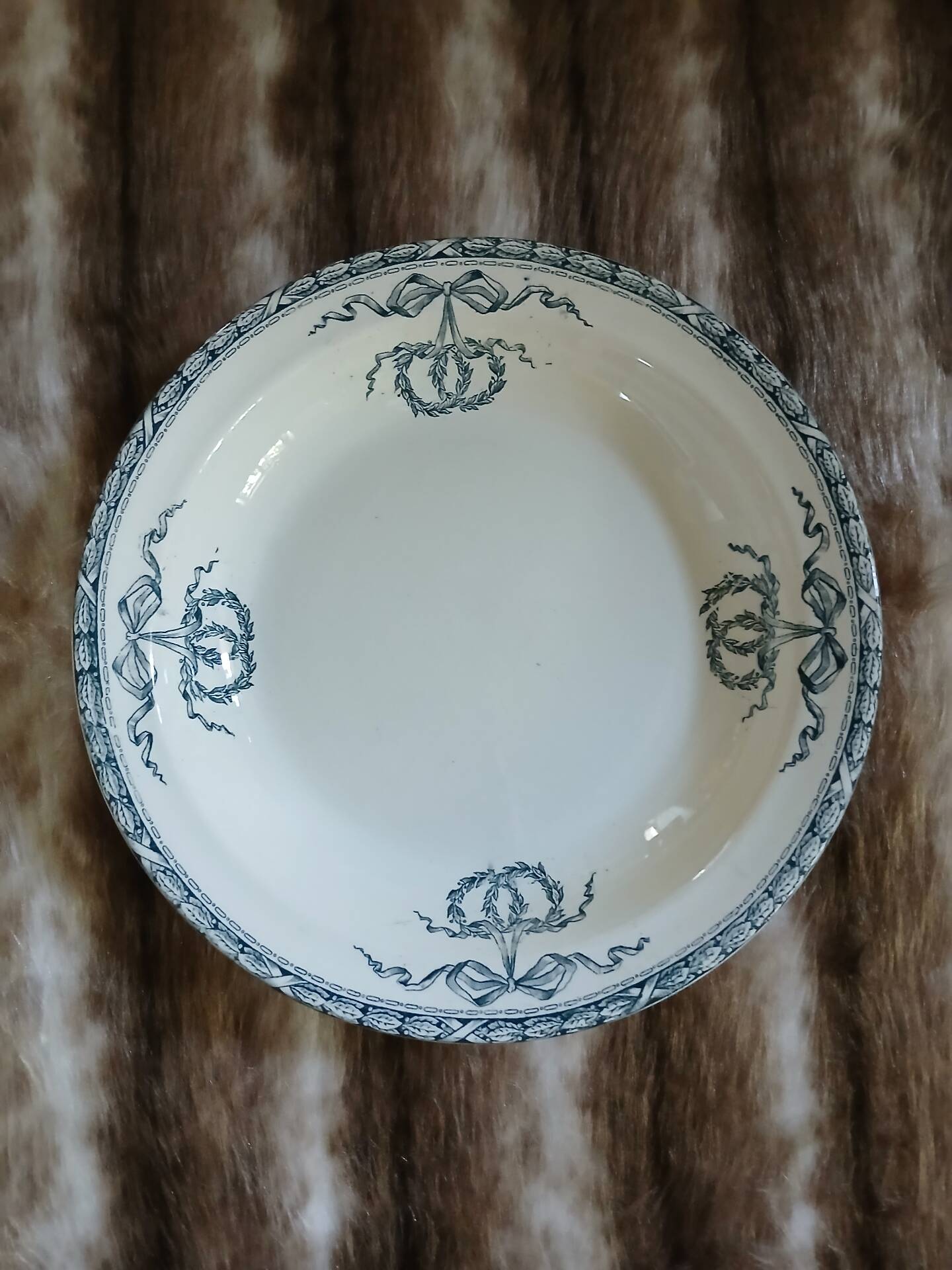 Old hollow dish made of Salins ironstone.