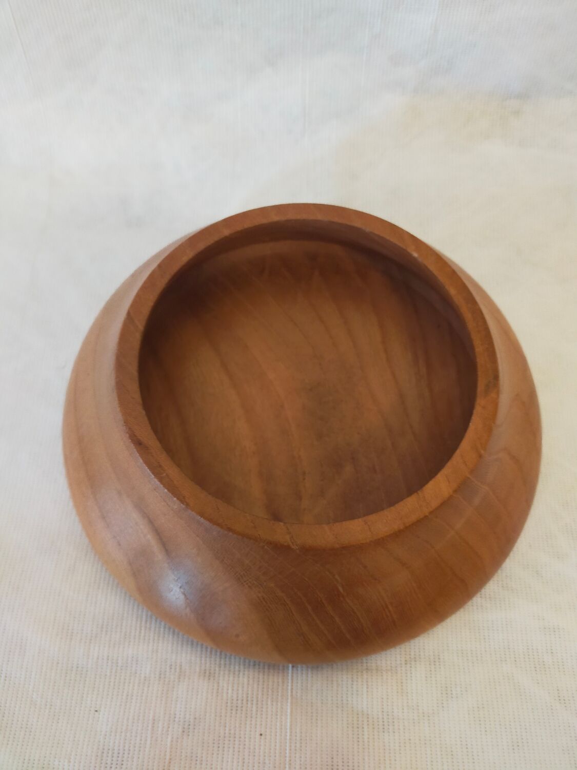 Empty turned wooden pocket