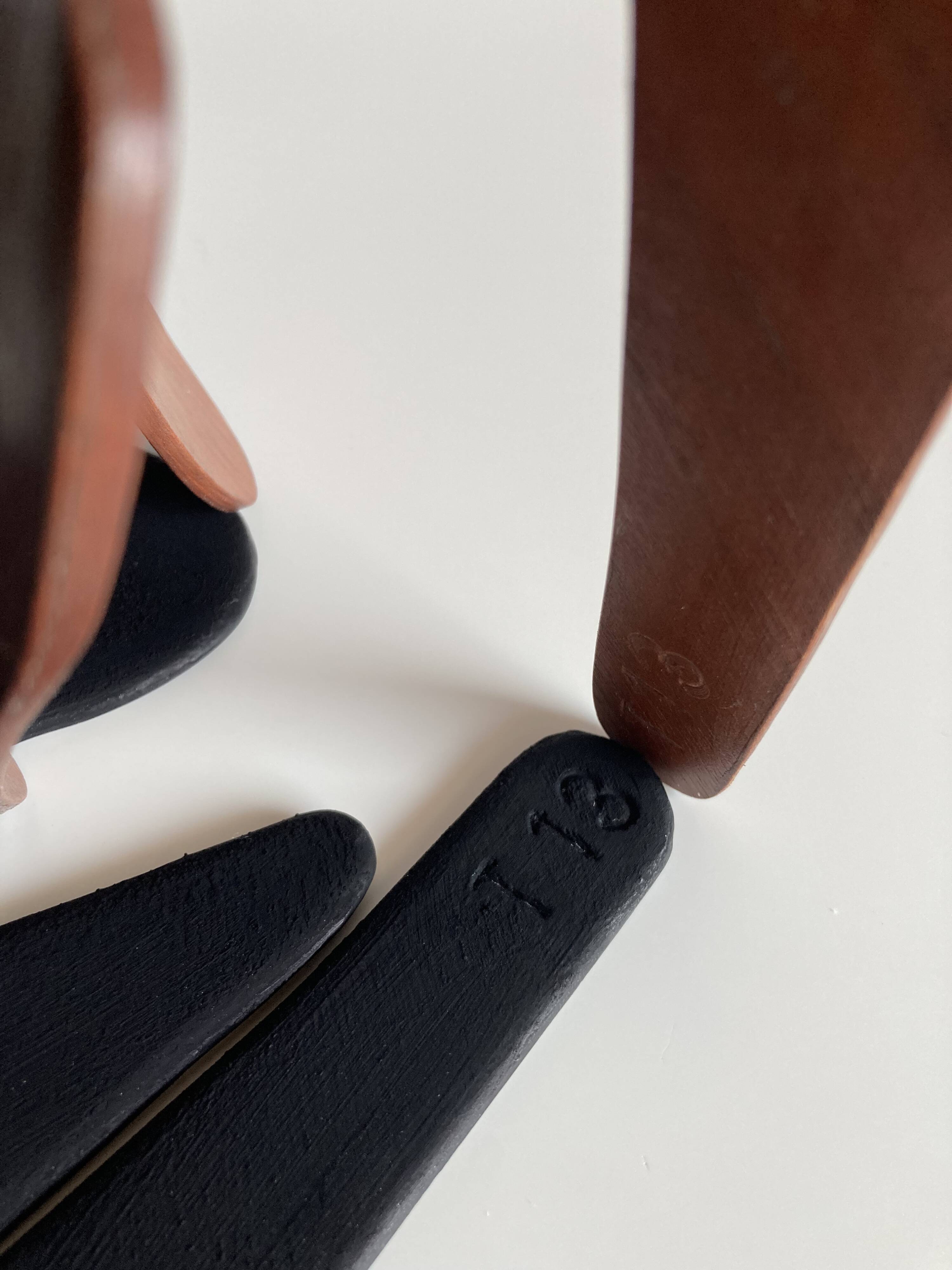 Mrs. Charles Eames_ The shadow does not bend, walnut plywood sculpture