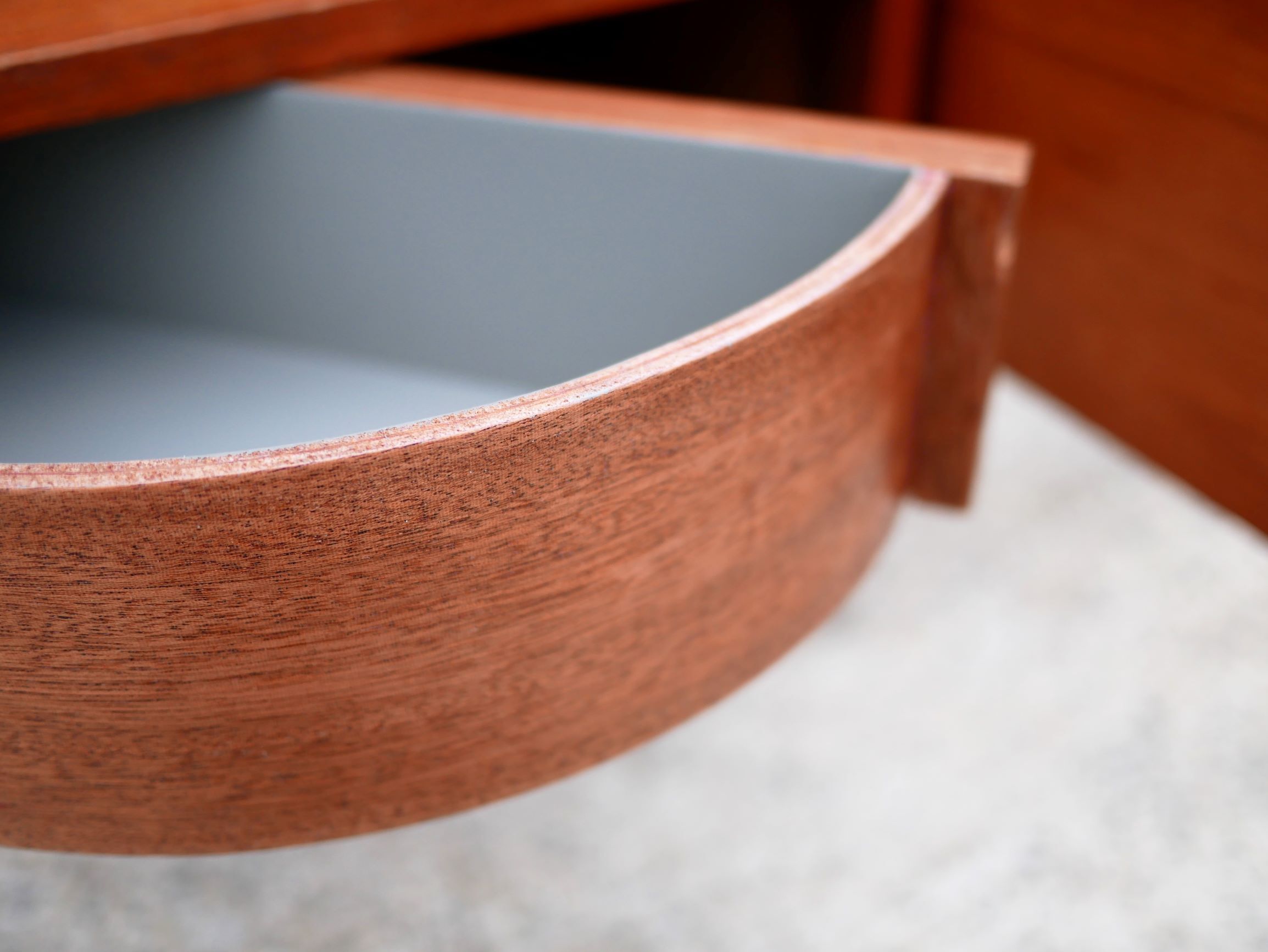 Teak bed with hanging bedside tables from the 60s