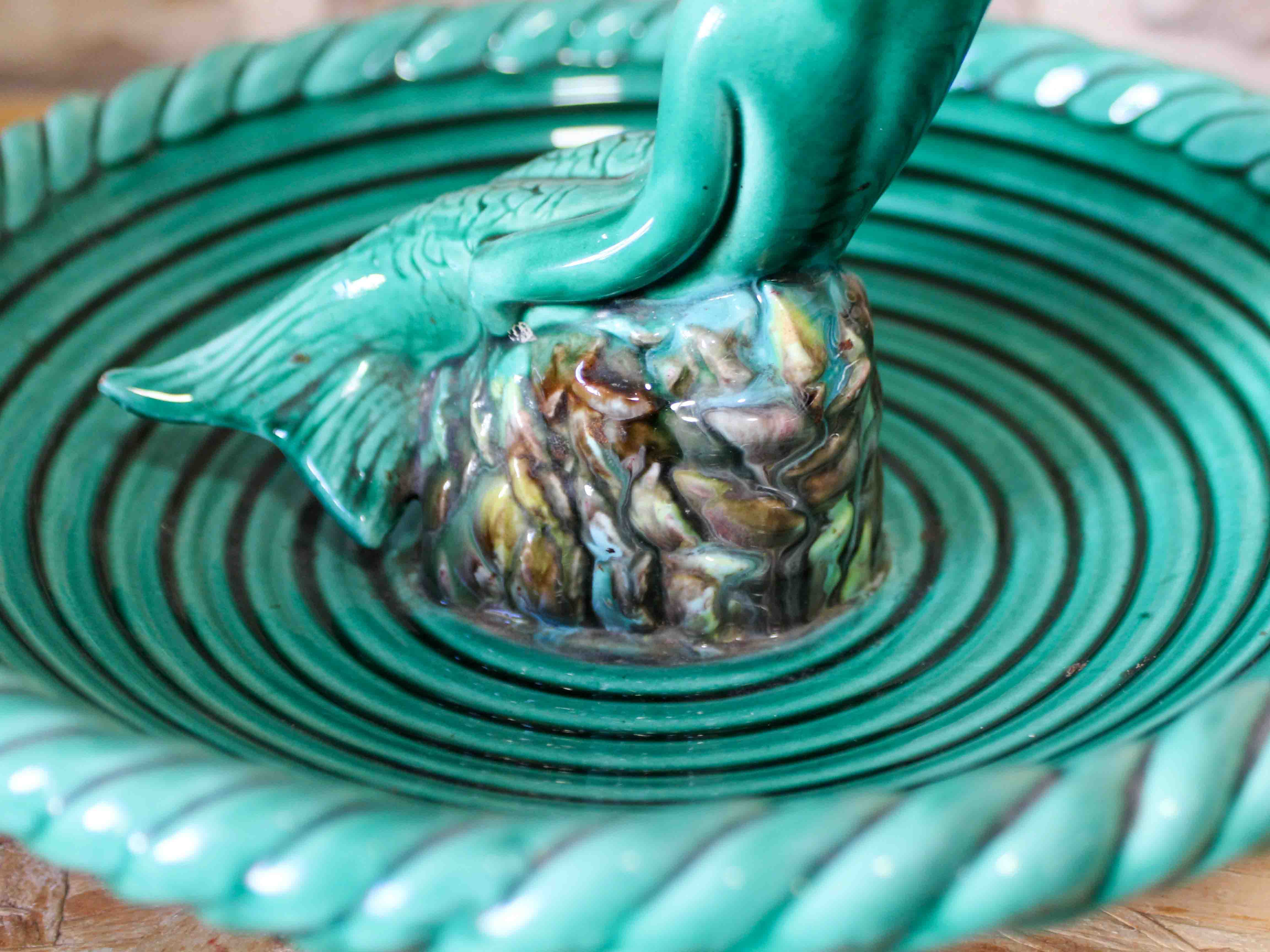 Ceramic cup with mermaid decoration