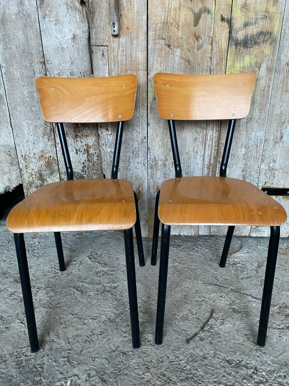 Pair of antique chairs in black metal + wooden seat & back