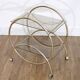 Glass and gold metal rolling trolley 1970