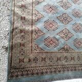 Old oriental carpet made hands. Signature. (175 x 125 )