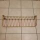 Wall coat rack, golden aluminium coat hooks and scoubidou.