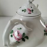 Porcelain teapot with rose patterns