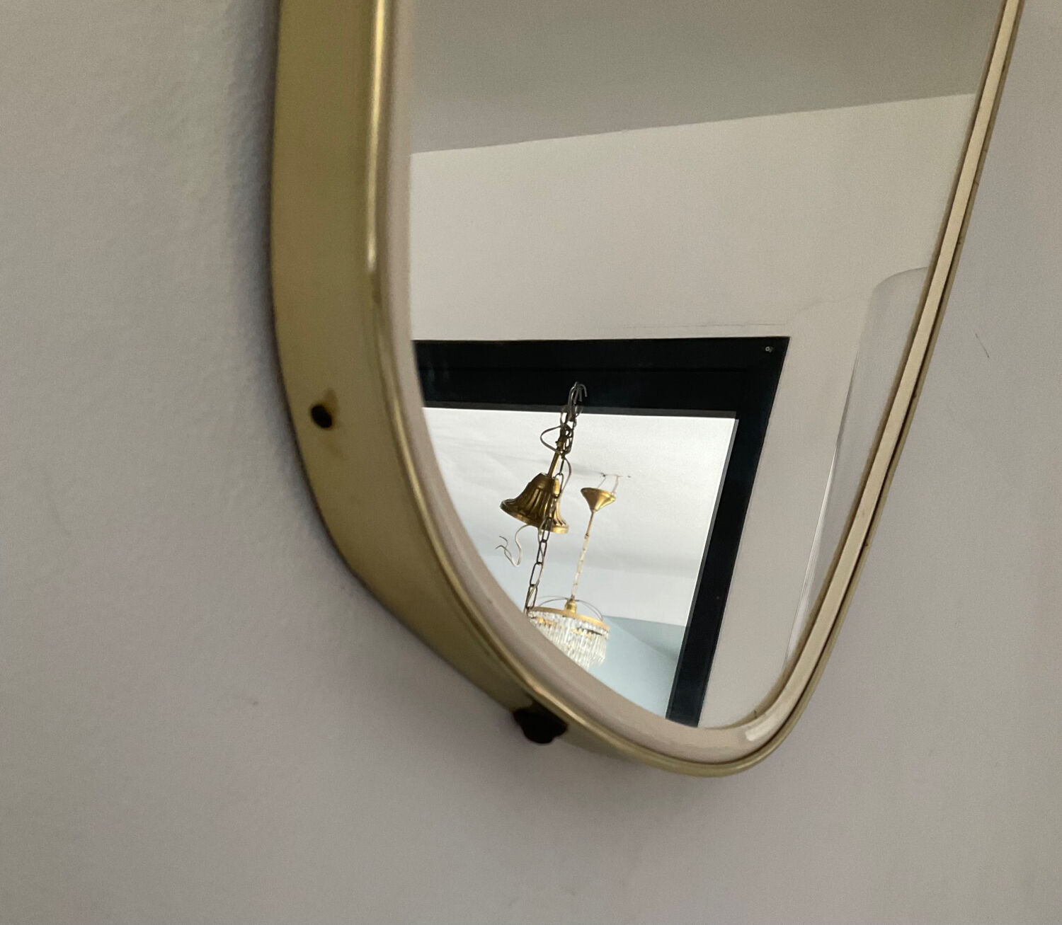 Asymmetrical mirror from the 60s freeform