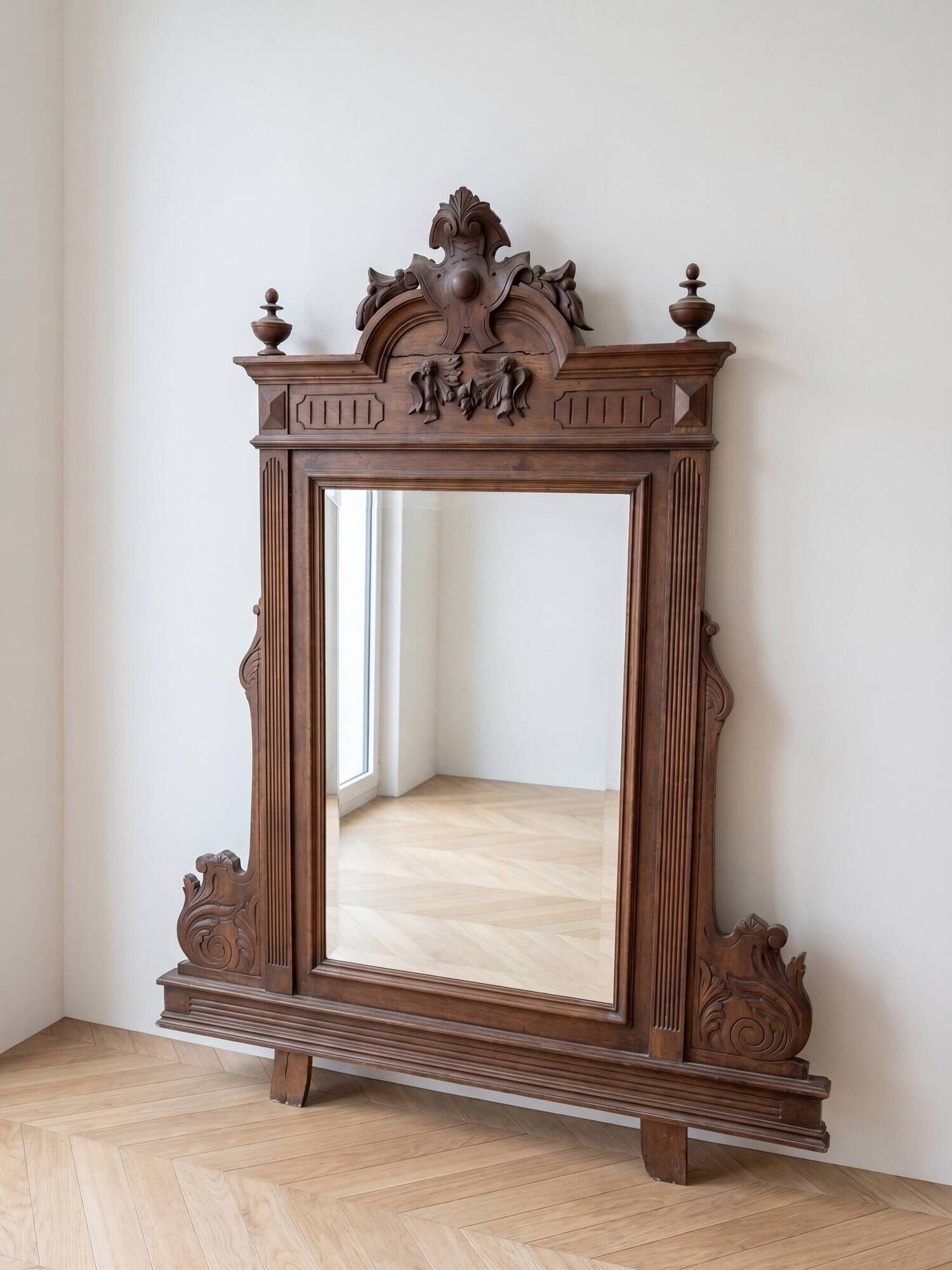 Antique wooden commode with marble top and mirror.