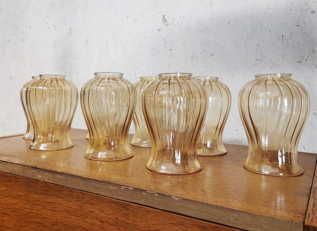 Set of 7 amber glass globes