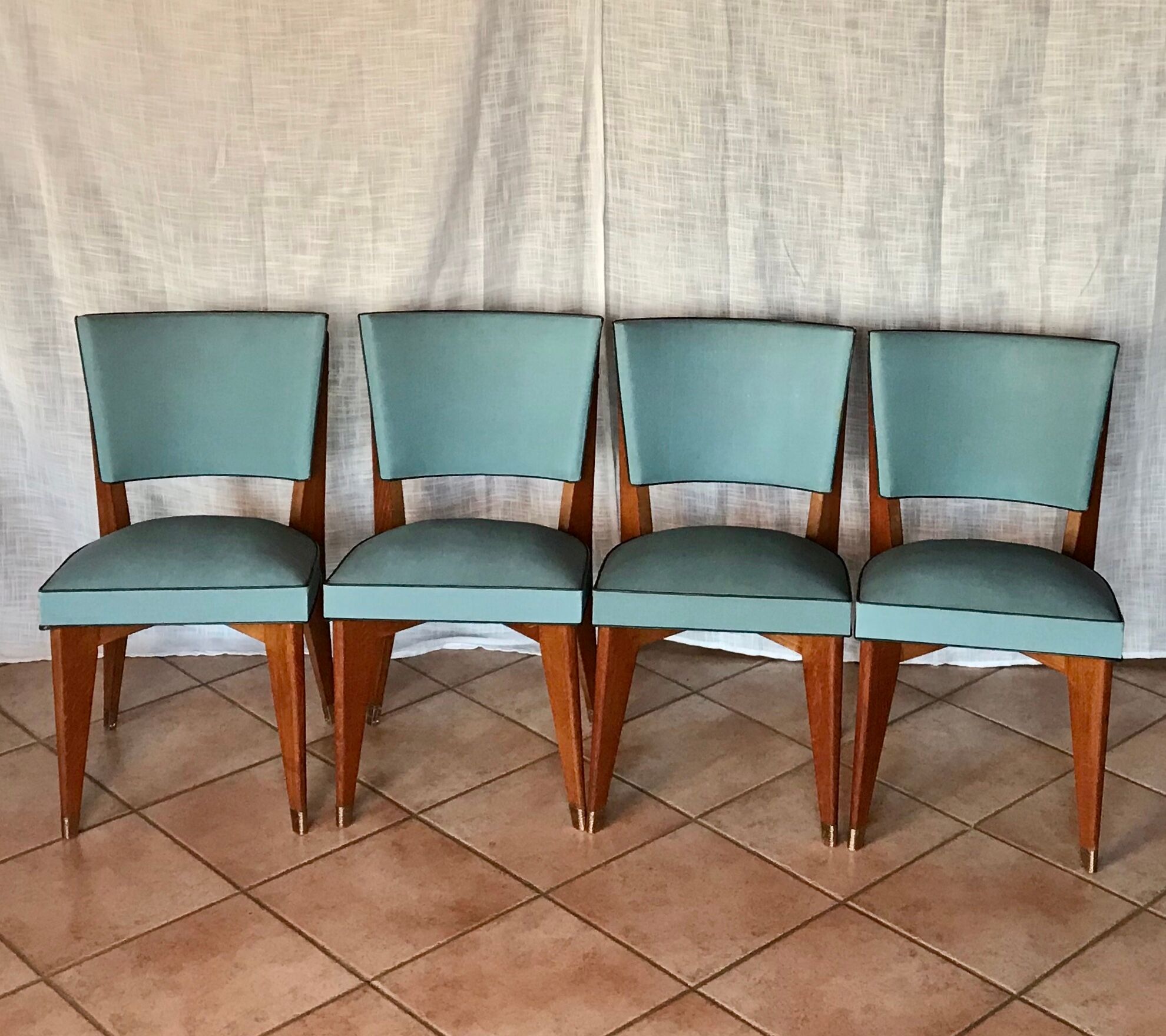 Suite of 4 chairs 50s skai