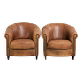 Sturdy set of vintage sheepskin club armchairs with a great appearance