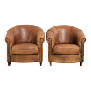 Sturdy set of vintage sheepskin club armchairs with a great appearance