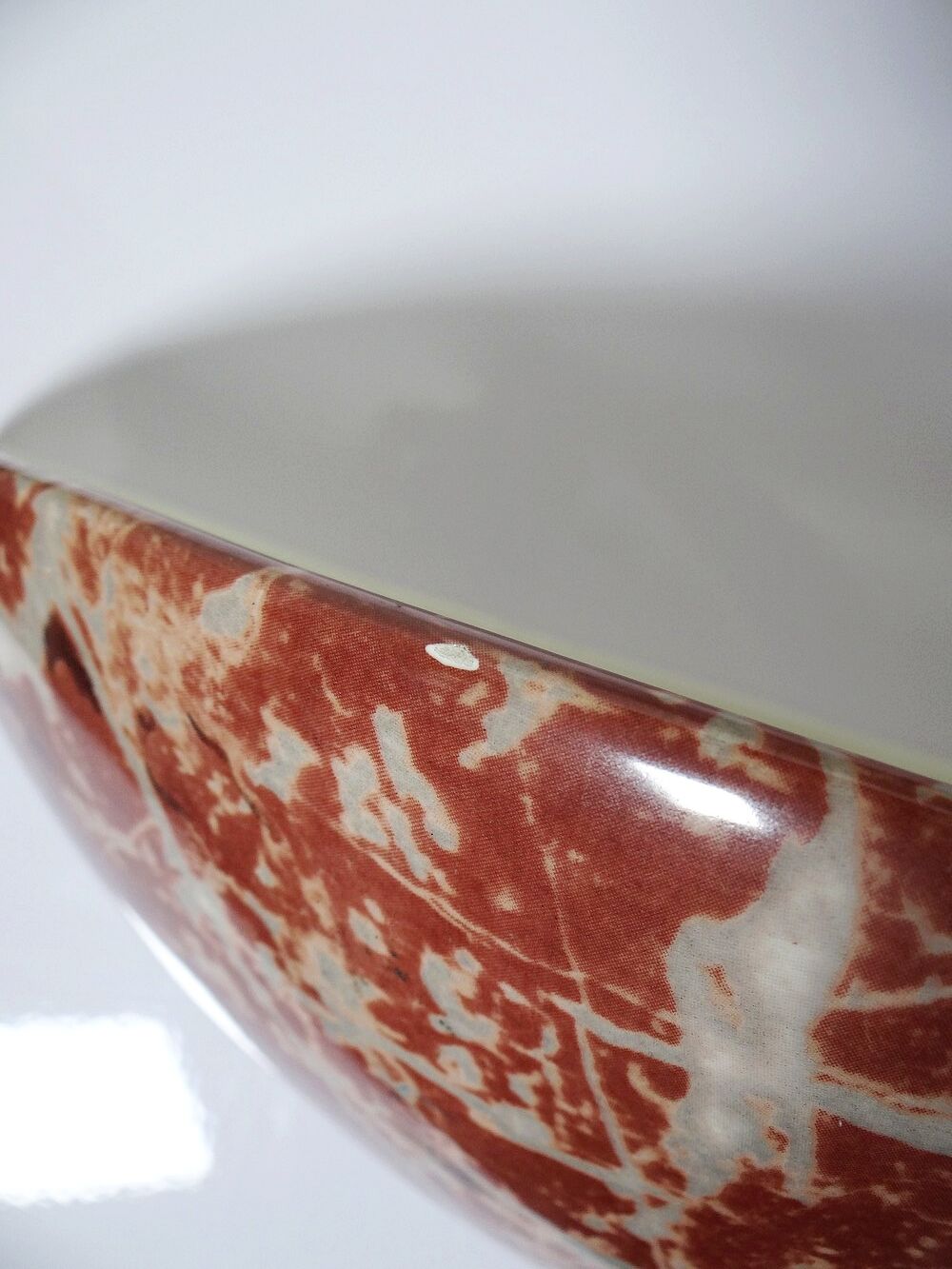 Pair of vintage wall sconces in faux red marble ceramic, 1990s.