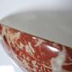 Pair of vintage wall sconces in faux red marble ceramic, 1990s.
