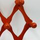 Vintage orange accordion coat rack