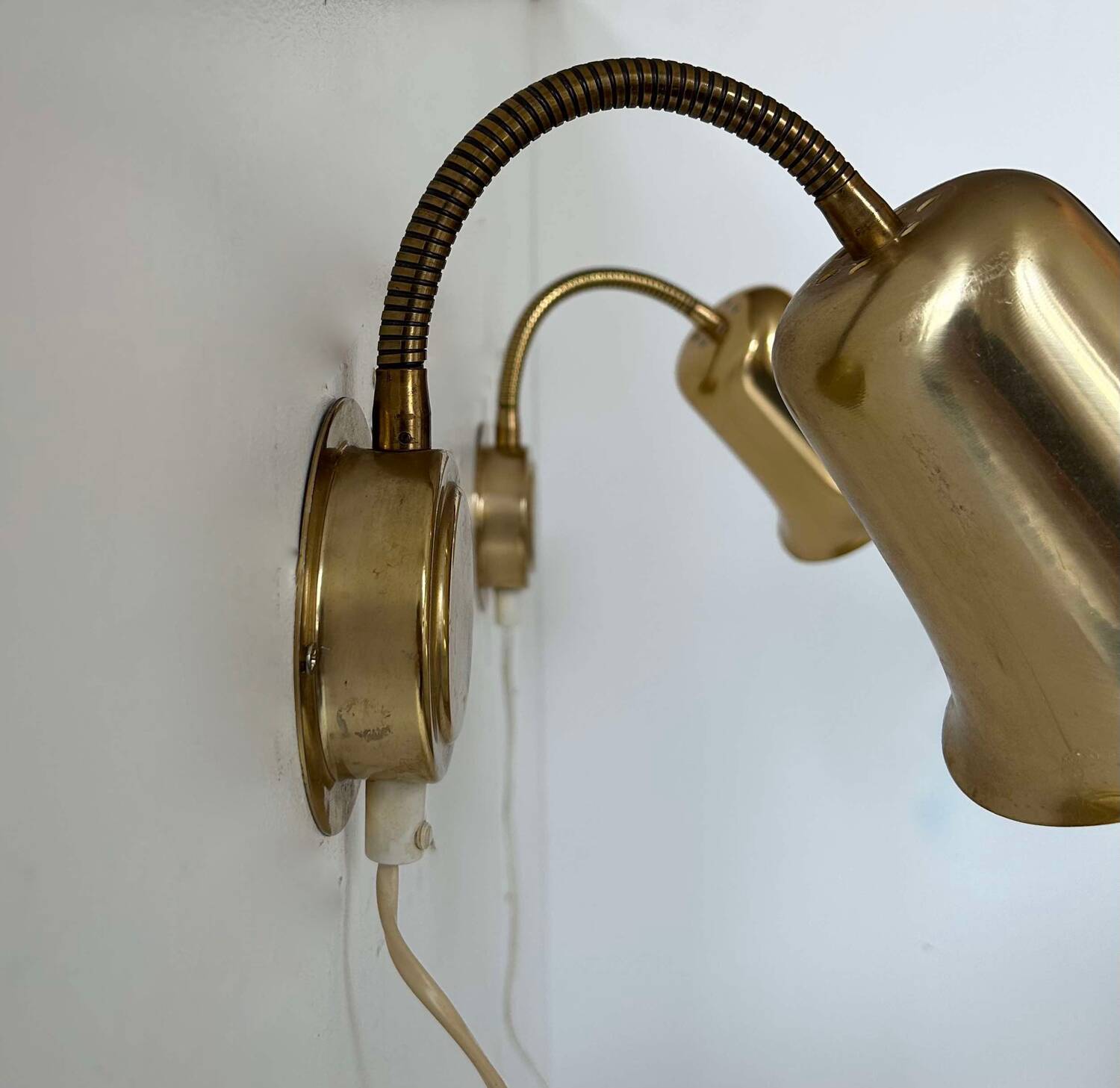 Pair of vintage adjustable wall lights, solid brass, Sweden 1960