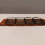 Teak Cabaret tray with four smoke coloured glass bowls, Danish and produced by Wiggers 1970s.
