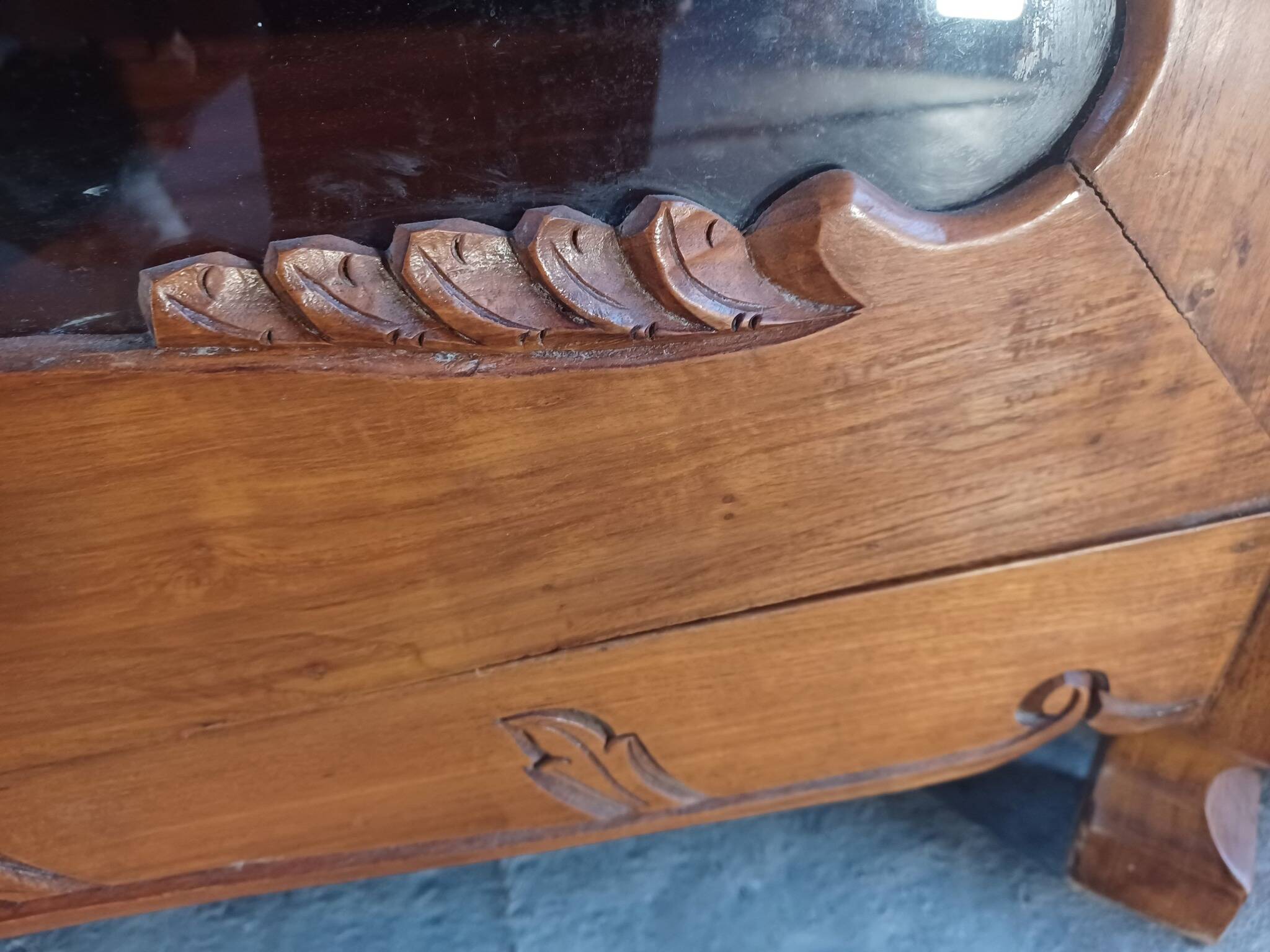 Large glass and carved cabinet