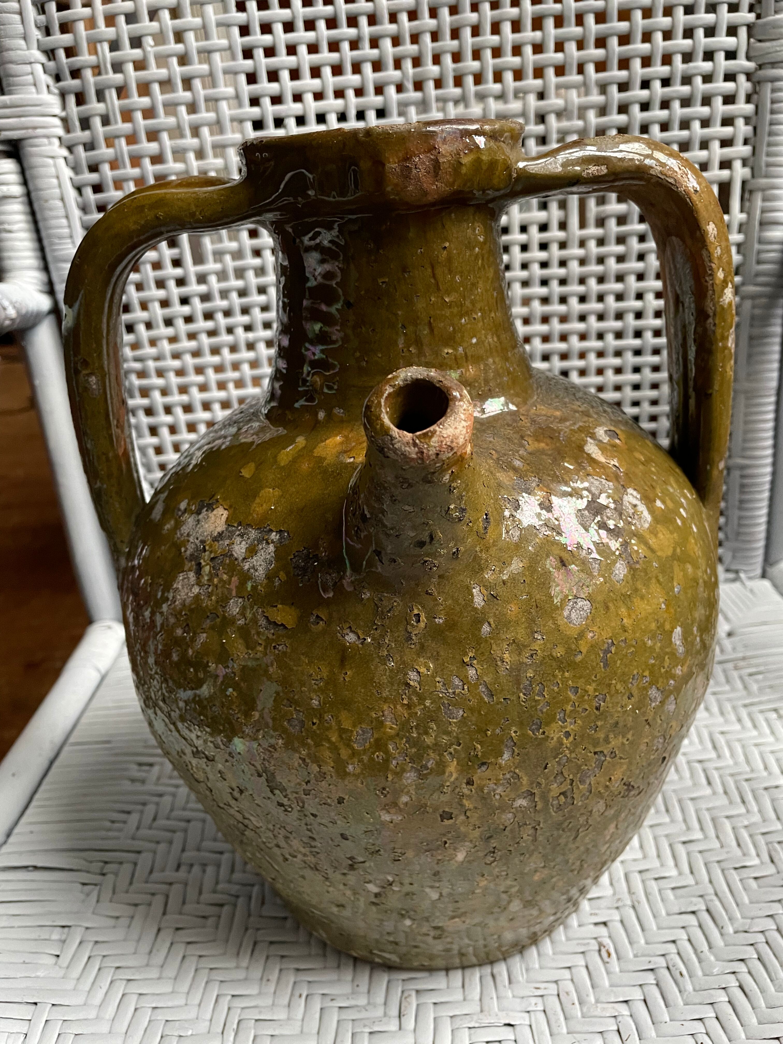 Khaki green glazed terracotta oil jar, 18th-19th century