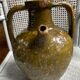 Khaki green glazed terracotta oil jar, 18th-19th century
