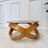 Smoked glass and curved wood coffee table