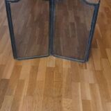 Metal fireplace screen made up of 4 leaves