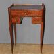 Pair of Louis XV style bedside tables in marquetry, 20th century.