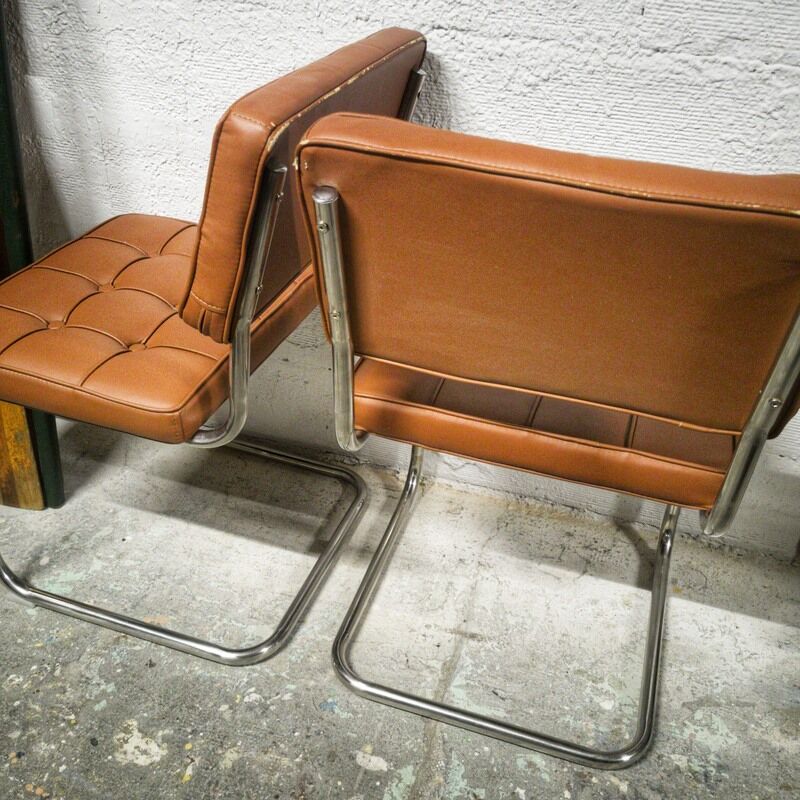 Pair of cantilever chrome and skaï chairs