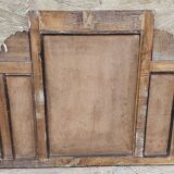 Old arched mirror in Burmese teak