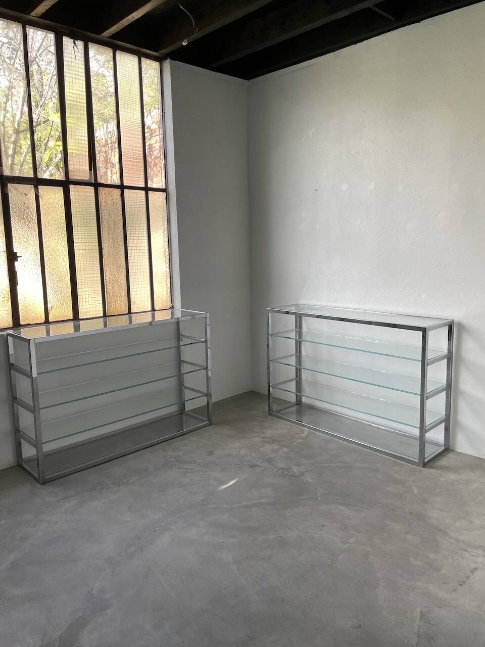 Pair of chrome and glass shelves from the 70s