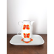 Small dish and its 70s cup