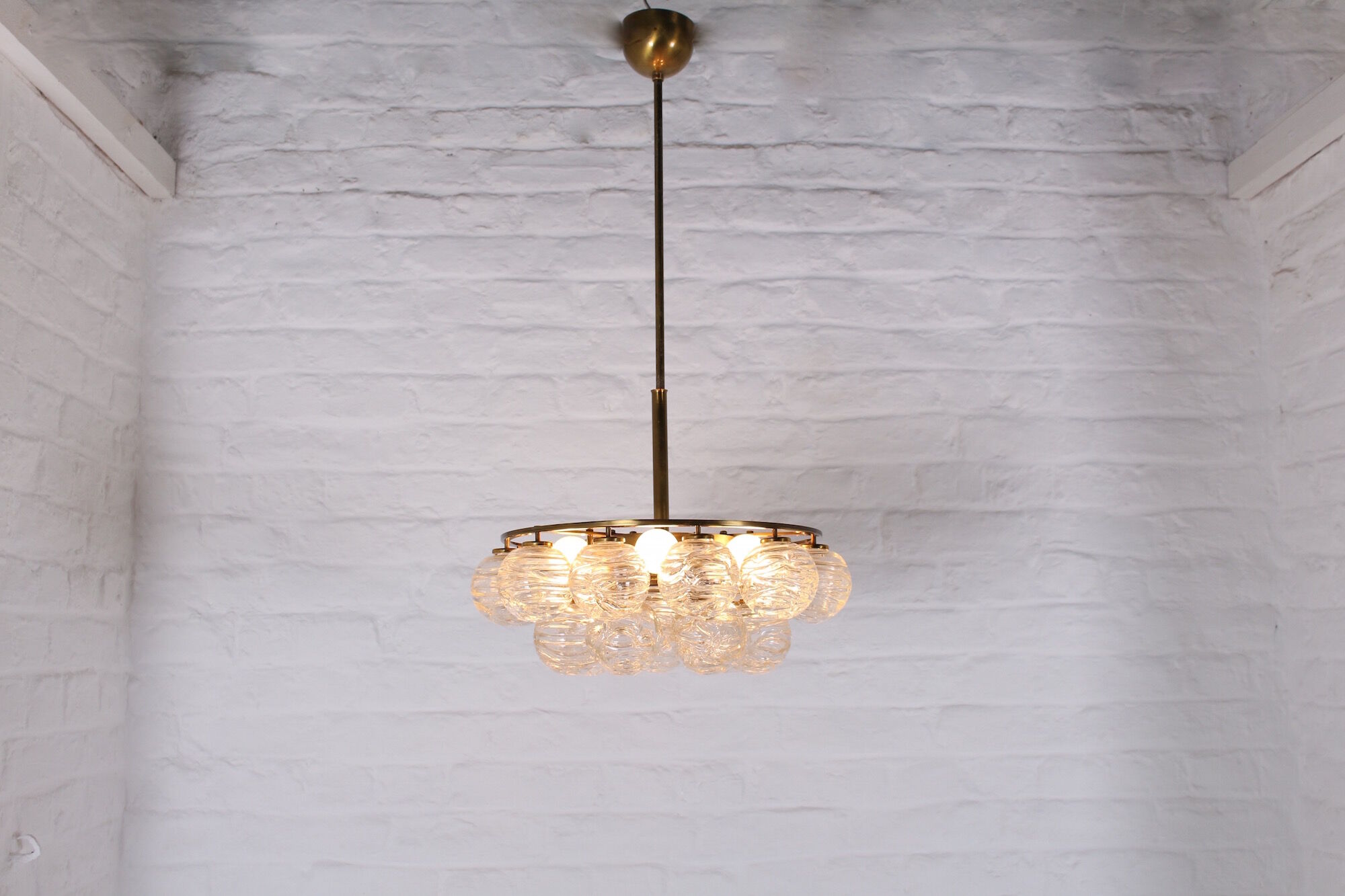 Brass chandelier and glass globes