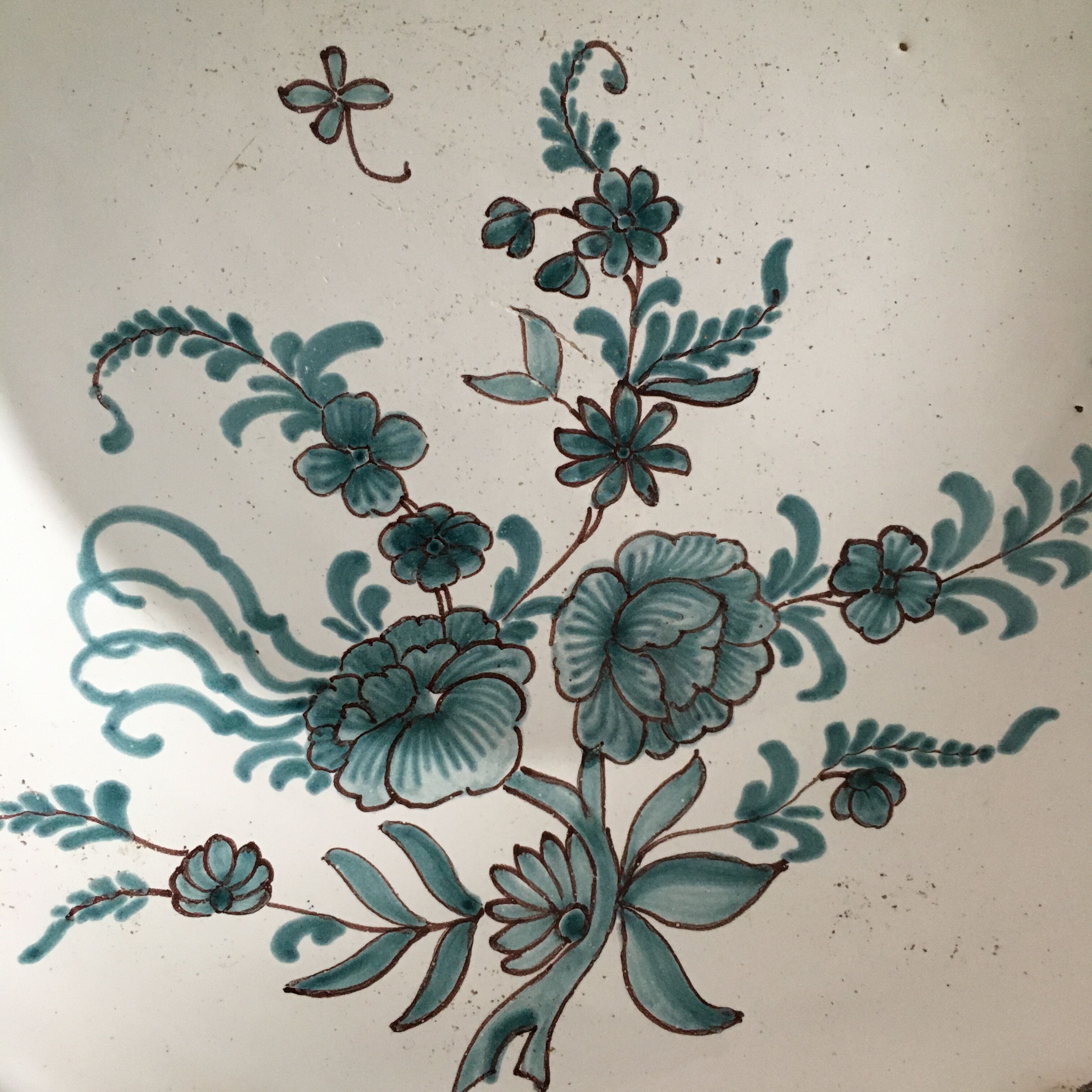 Antique plate with floral decoration