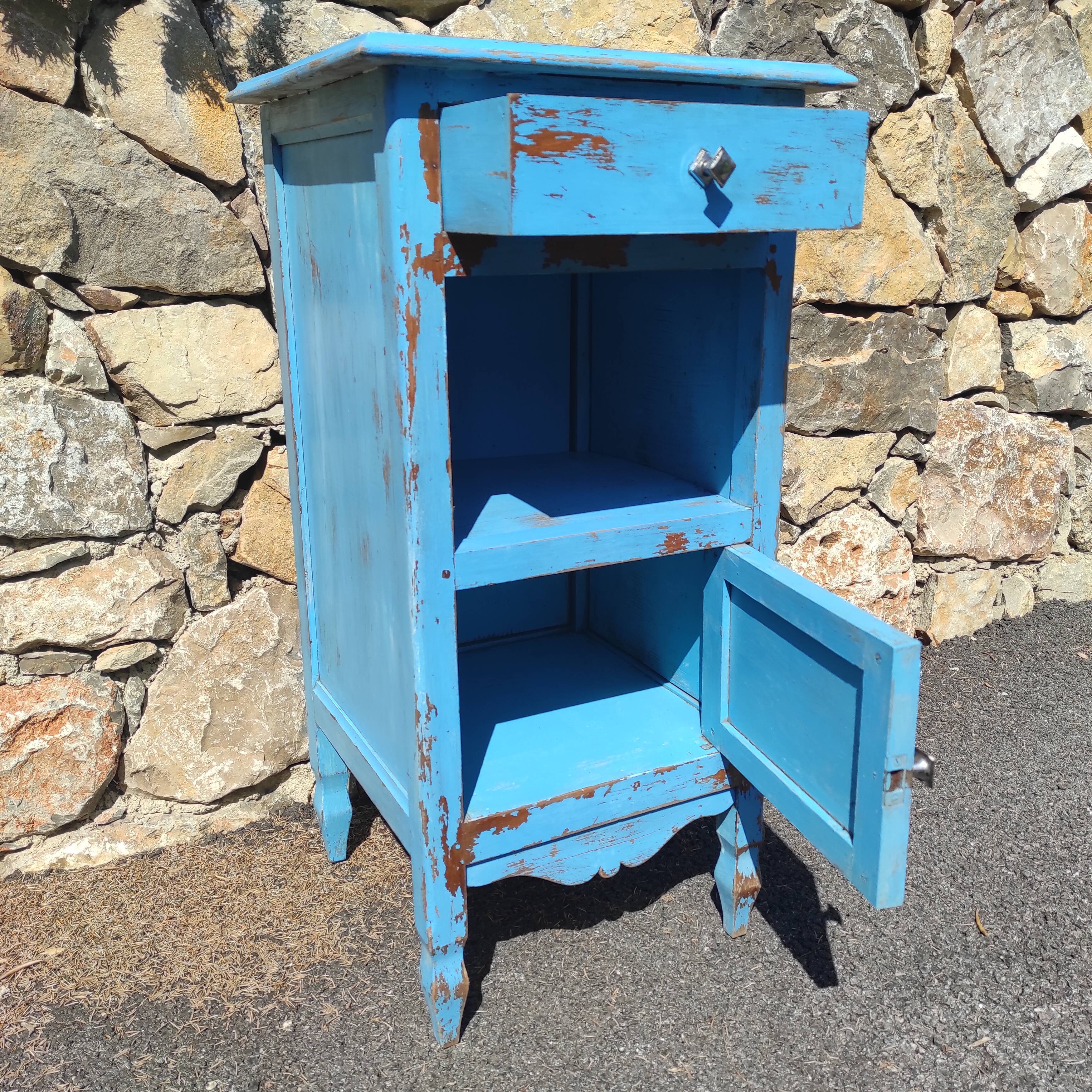 Old bedside table with 1 drawer and 1 door painted in lavender blue