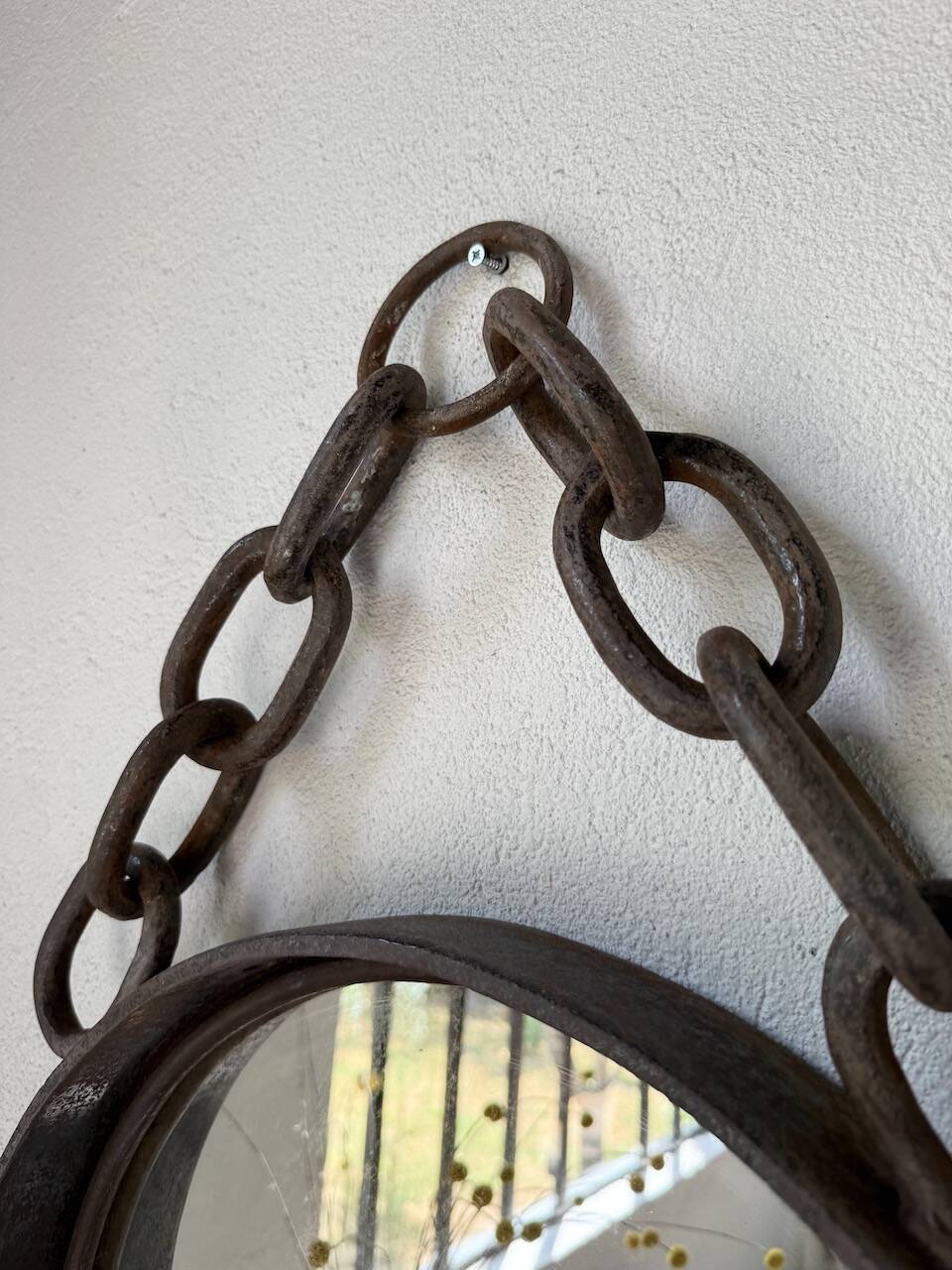 Brutalist mirror with metal chain from the 50s