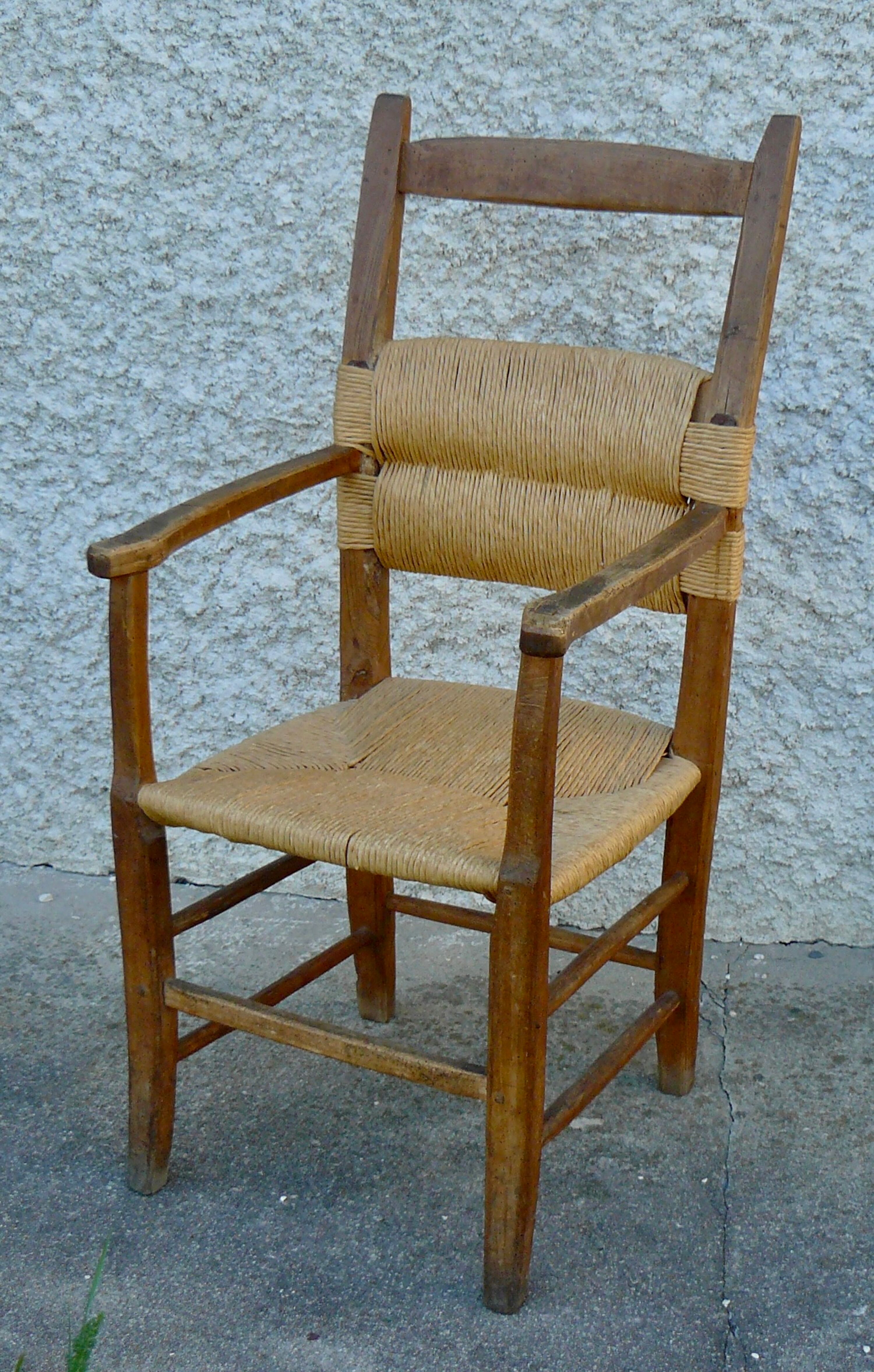 Brutalist straw armchair Folk art