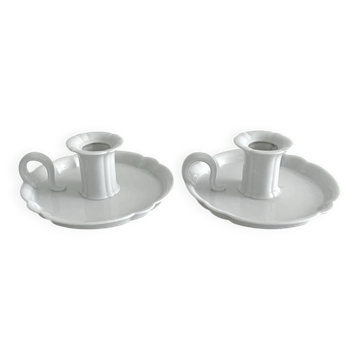 2 antique hand candlesticks in white porcelain