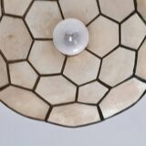 Mother-of-pearl suspension