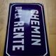 Old Enamelled and bulging "Chemin de la Rente" street plate, in perfect condition, on its cast iron support