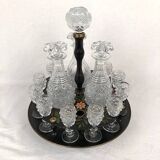 Liquor cabaret in 19th century painted sheet metal, carafes and glasses attributed to the Creusot crystal factory