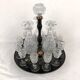 Liquor cabaret in 19th century painted sheet metal, carafes and glasses attributed to the Creusot crystal factory