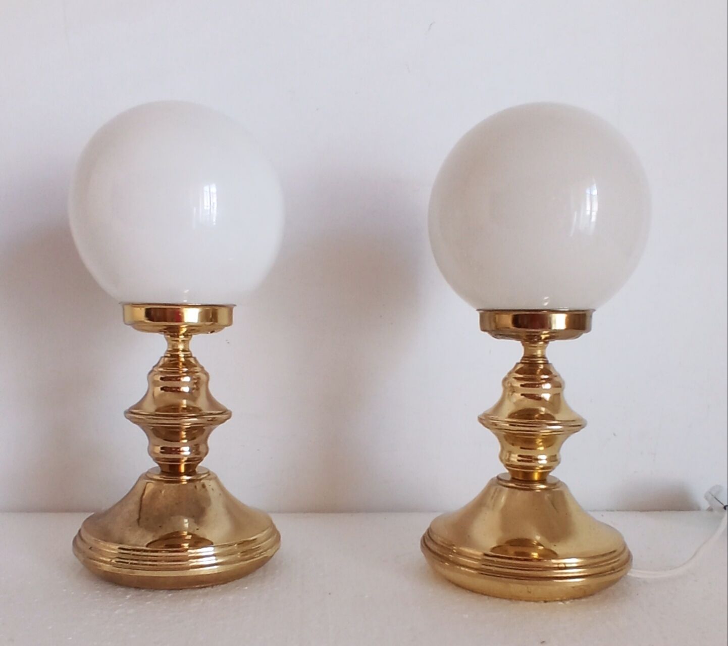 Pair of golden lamps