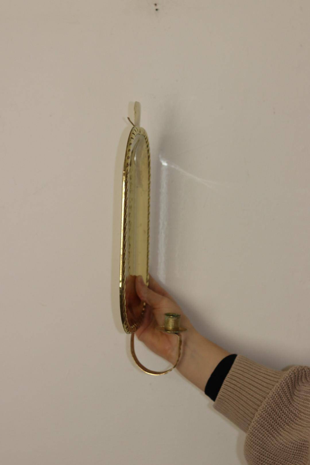 Pair of Swedish brass wall sconces from the mid-century.