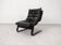 fauteuil lounge scandinave à dossier haut en cuir