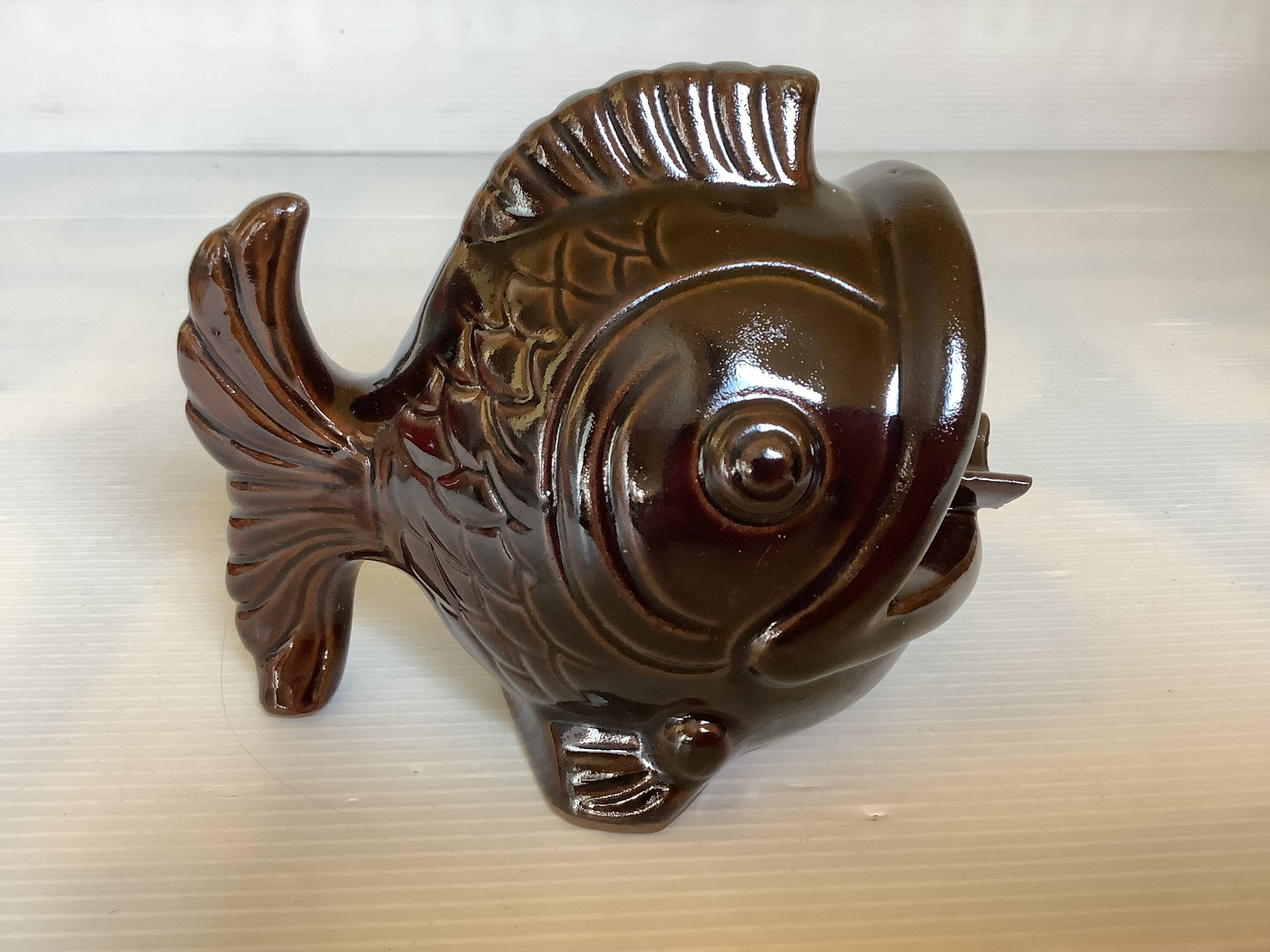 Brown ceramic fish ashtray