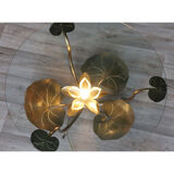 Illuminated vintage coffee table decorated with brass water lilies 1970